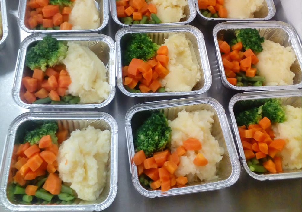 Image of mayfair meals preparation - vegetables in takeaway cases.